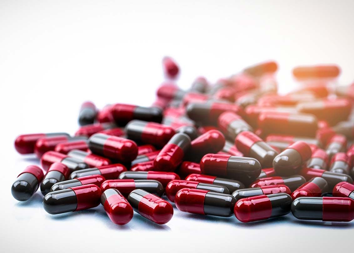 red-grey capsule pills