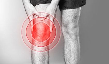 Man suffering from pain in knee